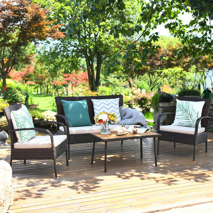 Ensemble de conversation en osier rembourré de 4 pièces avec plateau de table en bois d'acacia